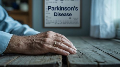 What are the first symptoms of Parkinson’s disease